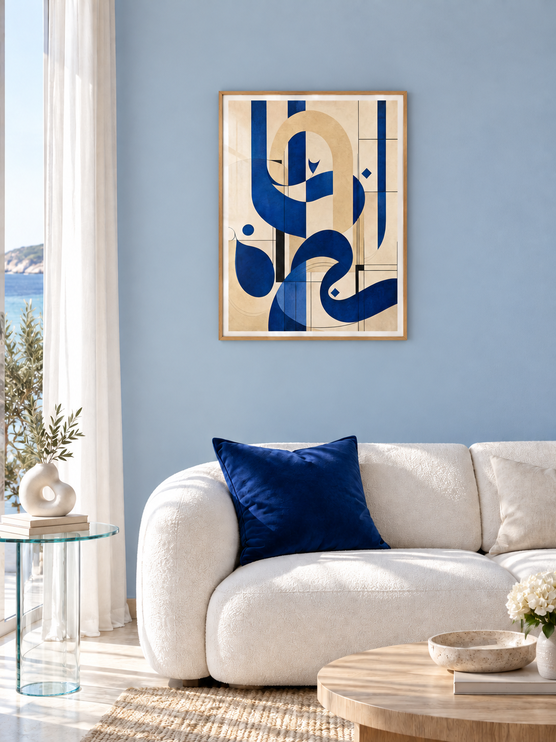 Blue Arch: blue Arabic-inspired calligraphy and arch forms, displayed in a slim light wooden texture PVC frame in a styled interior.