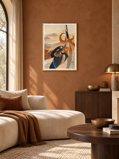 Desert Flow: sand-toned flowing Arabic-inspired abstract art, displayed in a slim gold frame in a styled interior.