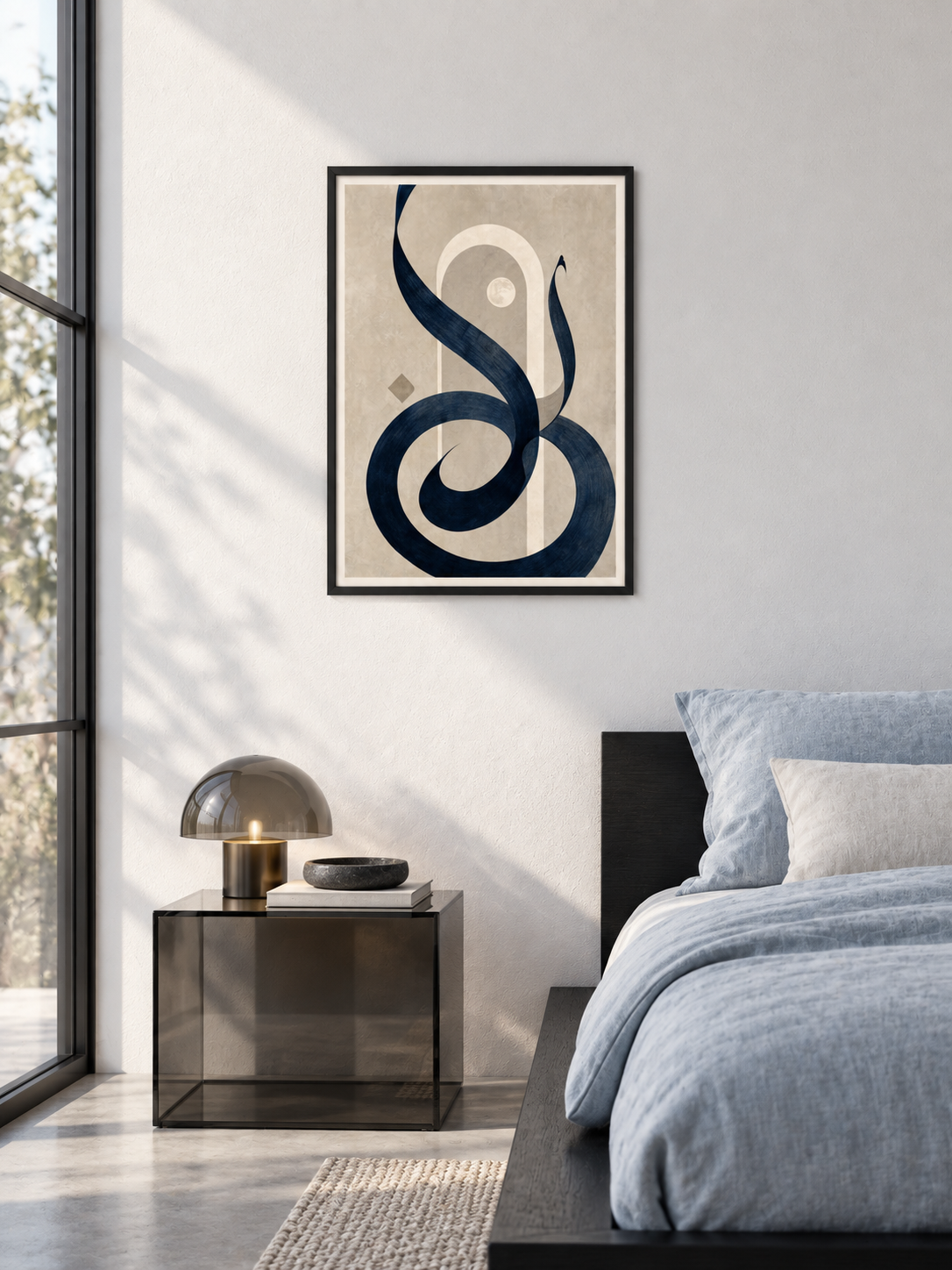 Moonline: navy calligraphic curves with a pale arch and moon-like circle, displayed in a slim black frame in a styled interior.