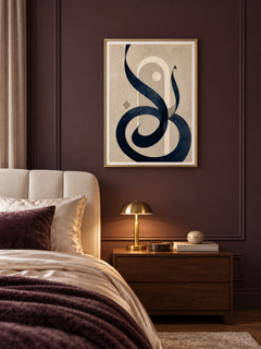 Moonline: navy calligraphic curves with a pale arch and moon-like circle, displayed in a slim gold frame in a styled interior.