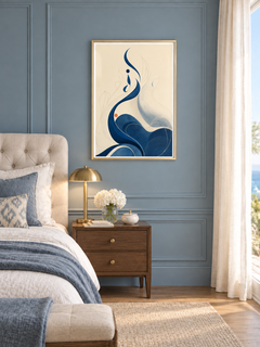 Sea Line: flowing blue Arabic-inspired curves and delicate gold-toned lines, displayed in a slim gold frame in a styled interior.