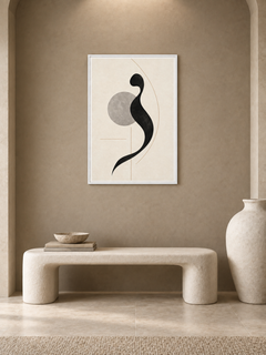 Quiet Mark: minimal black calligraphic form with a grey circle, displayed in a slim white frame in a styled interior.