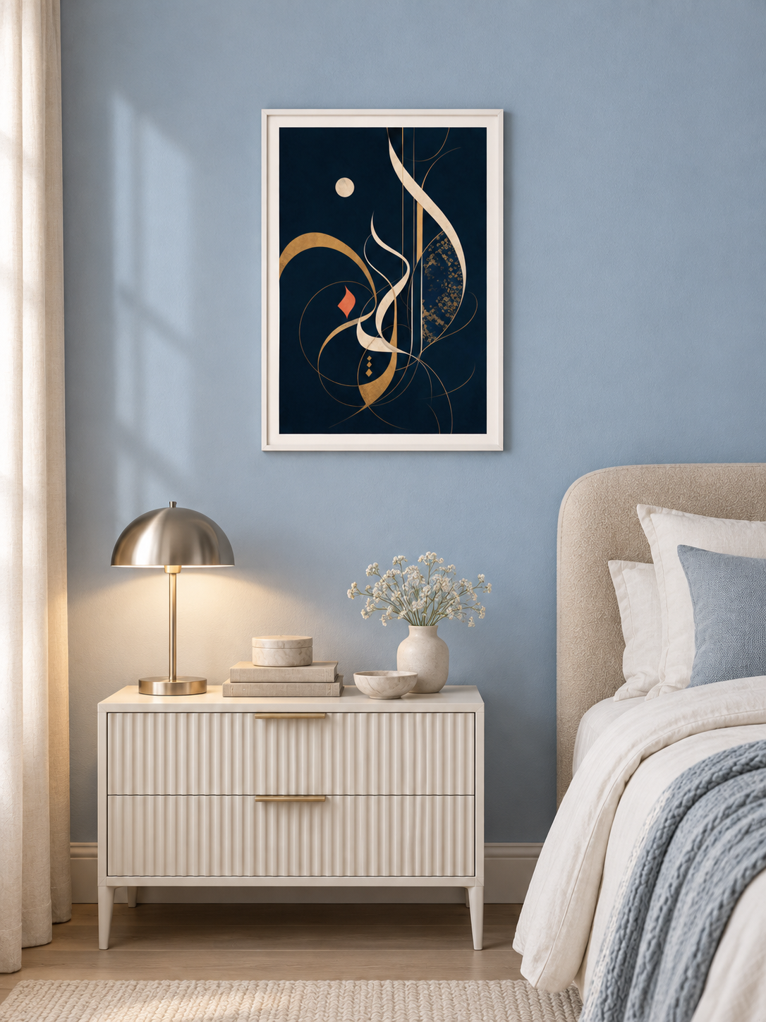 Night Script: cream and gold calligraphic strokes on deep navy, displayed in a slim white frame in a styled interior.