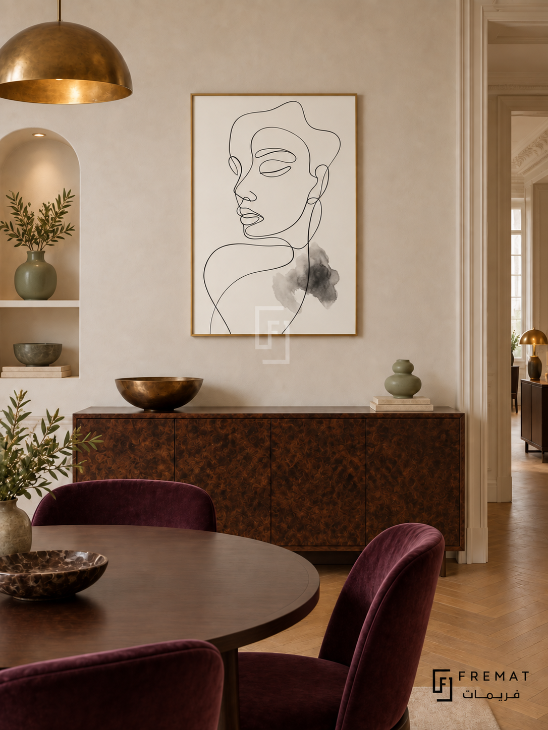 Contour by FREMAT: portrait line art in a gold PVC frame with a printed white border, displayed in a styled interior.