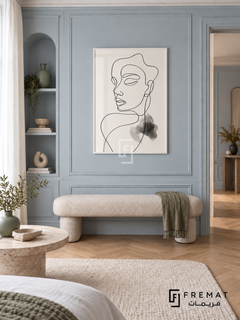 Contour by FREMAT: portrait line art in a white PVC frame with a printed white border, displayed in a styled interior.