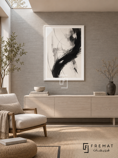 Ink Motion by FREMAT: expressive brushwork in a white PVC frame with a printed white border, displayed in a styled interior.