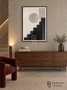 Graphic Steps by FREMAT: stepped geometric shapes in a black PVC frame with a printed white border, displayed in a styled interior.