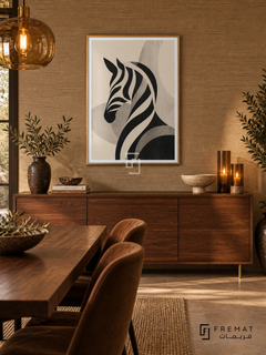 Animal Study by FREMAT: an abstract zebra in a gold PVC frame with a printed white border, displayed in a styled interior.