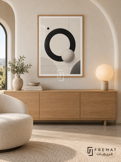 Orbit by FREMAT: orbital circles and a sphere in a wooden texture PVC frame with a printed white border, displayed in a styled interior.