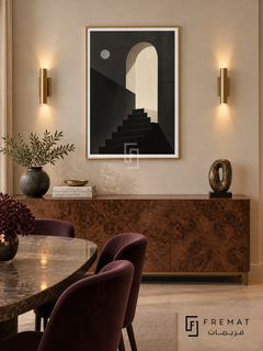 Night Stairs by FREMAT: a moonlit arch and staircase in a gold PVC frame with a printed white border, displayed in a styled interior.
