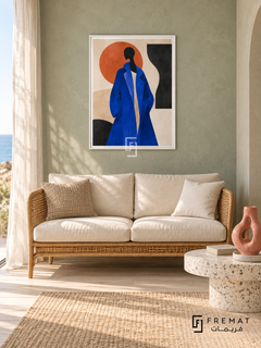 Fashion Block by FREMAT in a satin white PVC frame with a flat white printed border. Coastal sculptor retreat: pale sage tadelakt wall, 150cm honey rattan two-seat settee with cream cushions, low white terrazzo plinth table at right, bleached floorboards, gauzy side light, a single coral ceramic sculpture and generous empty space.