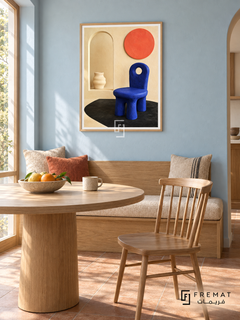 Cobalt Chair by FREMAT in a light natural wood PVC frame with a flat white printed border. Designer breakfast nook: pale blue chalk-painted wall, 145cm oak banquette with beige wool cushion beneath art, round natural ash table in foreground and simple spindle chair right, warm clay tile floor, morning window light and ceramic fruit dish.