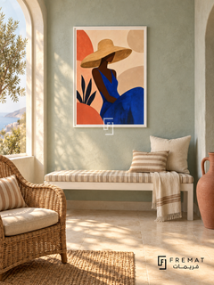 Sun Hat by FREMAT in a satin white PVC frame with a flat white printed border. Mediterranean guestroom nook: pale celadon plaster wall, 150cm painted white wooden bench with striped beige cushion, arched window left, honey wicker lounge chair, limestone floor, golden morning rays and matte coral vase.