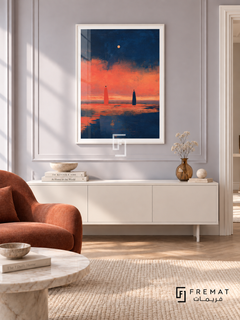 Evening Figures by FREMAT in a satin white PVC frame with a flat white printed border. Serene townhouse nook: pale lavender-grey panelled wall, 150cm satin-white console, rust linen accent chair left, round pale marble table, cream woven rug, diffuse early daylight and little clear amber vase.