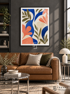 Abstract Garden NAT06 by FREMAT in a slim matte black PVC frame, with an even white printed border, subtle glazing reflections and furniture showing scale.