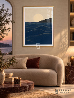 Ocean Lines NAT08 by FREMAT in a slim champagne gold PVC frame, with an even white printed border, subtle glazing reflections and furniture showing scale.