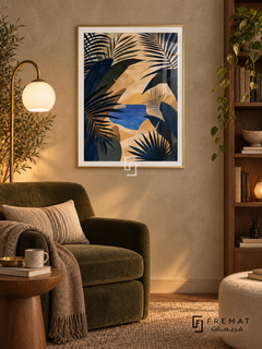 Oasis Leaves NAT10 by FREMAT in a slim champagne gold PVC frame, with an even white printed border, subtle glazing reflections and furniture showing scale.