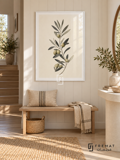 Olive Branch NAT12 by FREMAT in a slim satin white PVC frame, with an even white printed border, subtle glazing reflections and furniture showing scale.