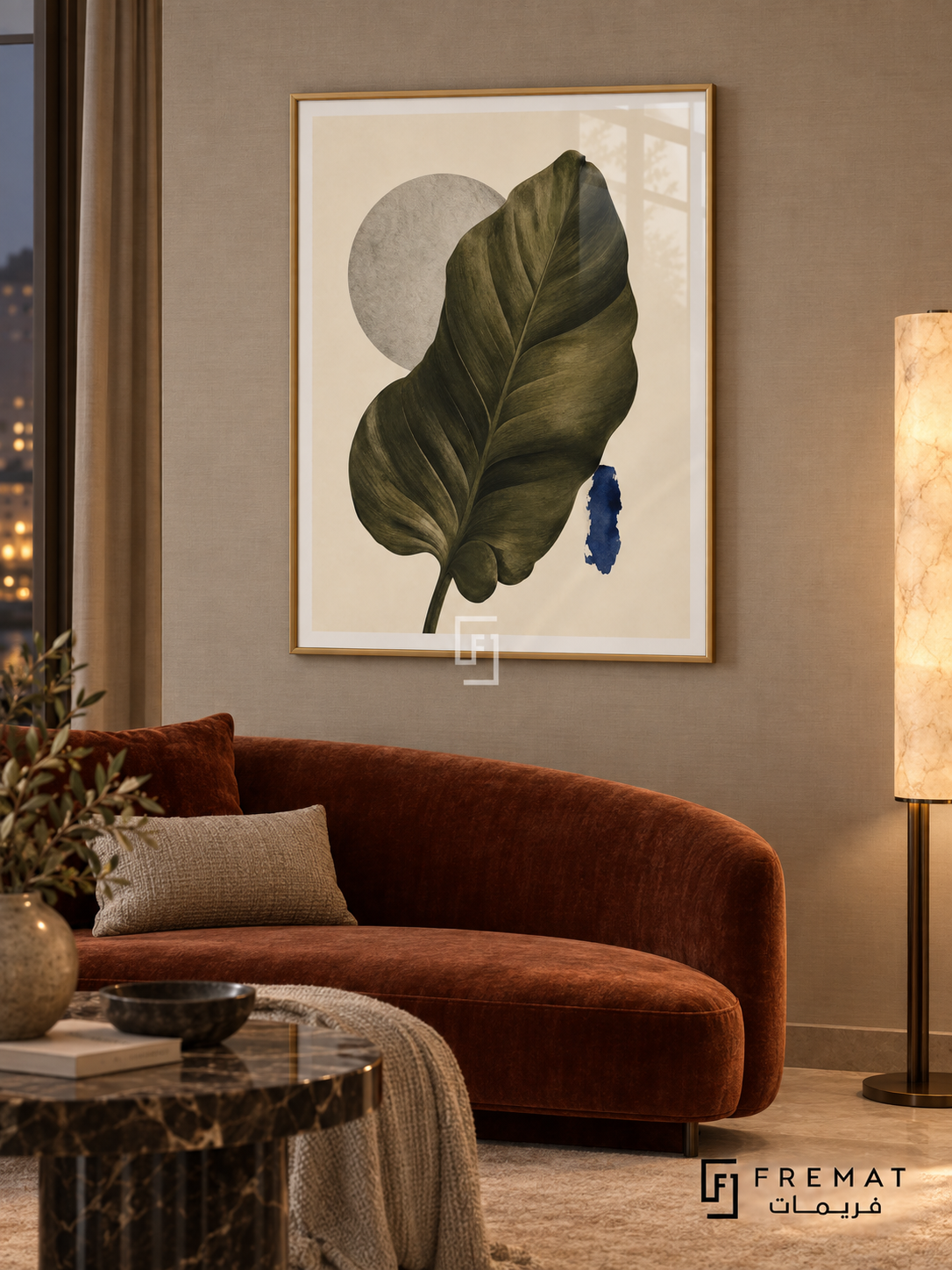 Leaf Study NAT15 by FREMAT in a slim champagne gold PVC frame, with an even white printed border, subtle glazing reflections and furniture showing scale.