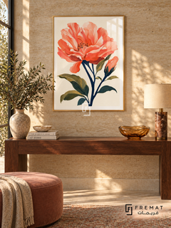 Coral Bloom NAT18 by FREMAT in a slim champagne gold PVC frame, with an even white printed border, subtle glazing reflections and furniture showing scale.