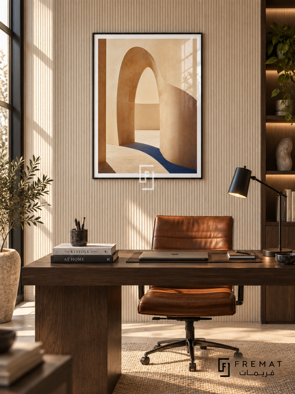 Quiet Arch architectural wall art in a slim matte black PVC frame above a smoked oak desk, with a white paper border and glass reflection.