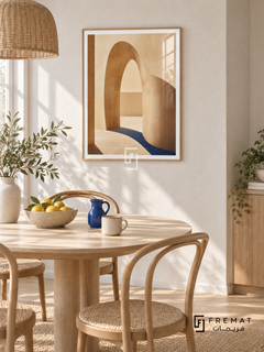 Quiet Arch (PLC01) framed architectural wall art with a light wood-grain PVC frame, flat white paper border and glass reflection. Airy Scandinavian breakfast nook, chalk-white plaster, ash oval dining table 150cm.