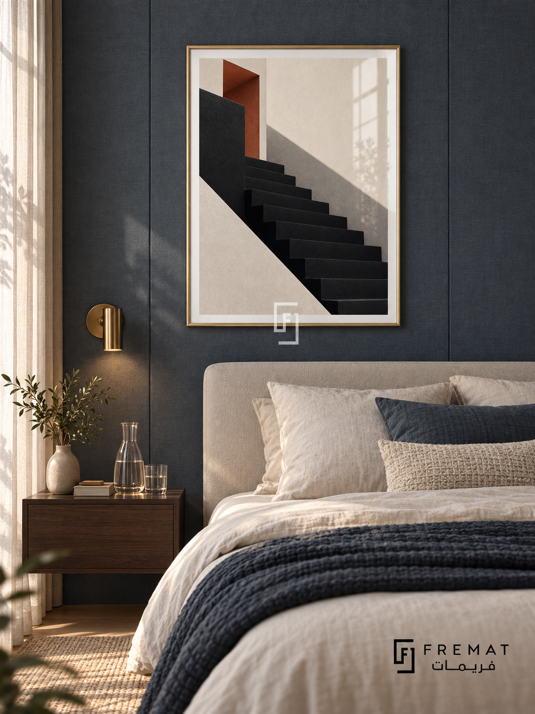Shadow Stair (PLC02) framed architectural wall art with a champagne gold PVC frame, flat white paper border and glass reflection. Moody boutique bedroom, slate-blue fabric wall panels, cream bed 160cm.