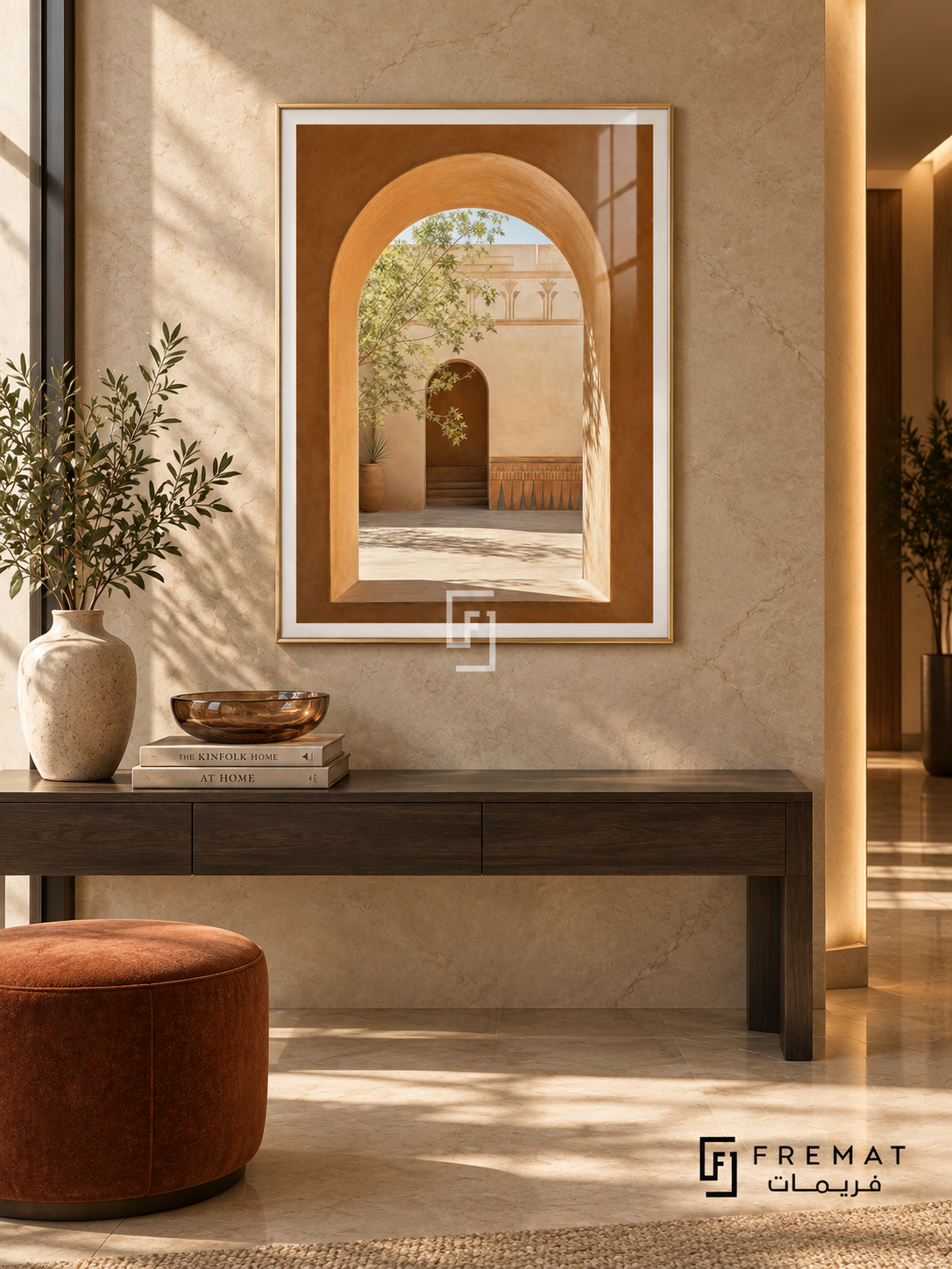 Courtyard Window (PLC03) framed architectural wall art with a champagne gold PVC frame, flat white paper border and glass reflection. Quiet luxury hallway, honed beige marble wall, slim dark console 150cm.