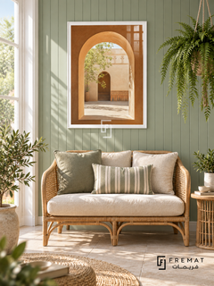 Courtyard Window (PLC03) framed architectural wall art with a satin white PVC frame, flat white paper border and glass reflection. Fresh sunroom, celadon beadboard wall, rattan loveseat 150cm.