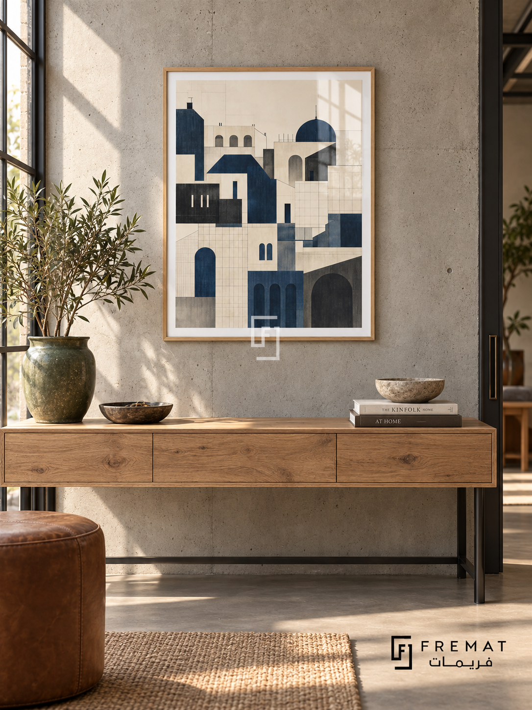 City Lines (PLC05) framed architectural wall art with a light wood-grain PVC frame, flat white paper border and glass reflection. Industrial loft entry, light concrete wall, raw oak console 150cm on steel legs.