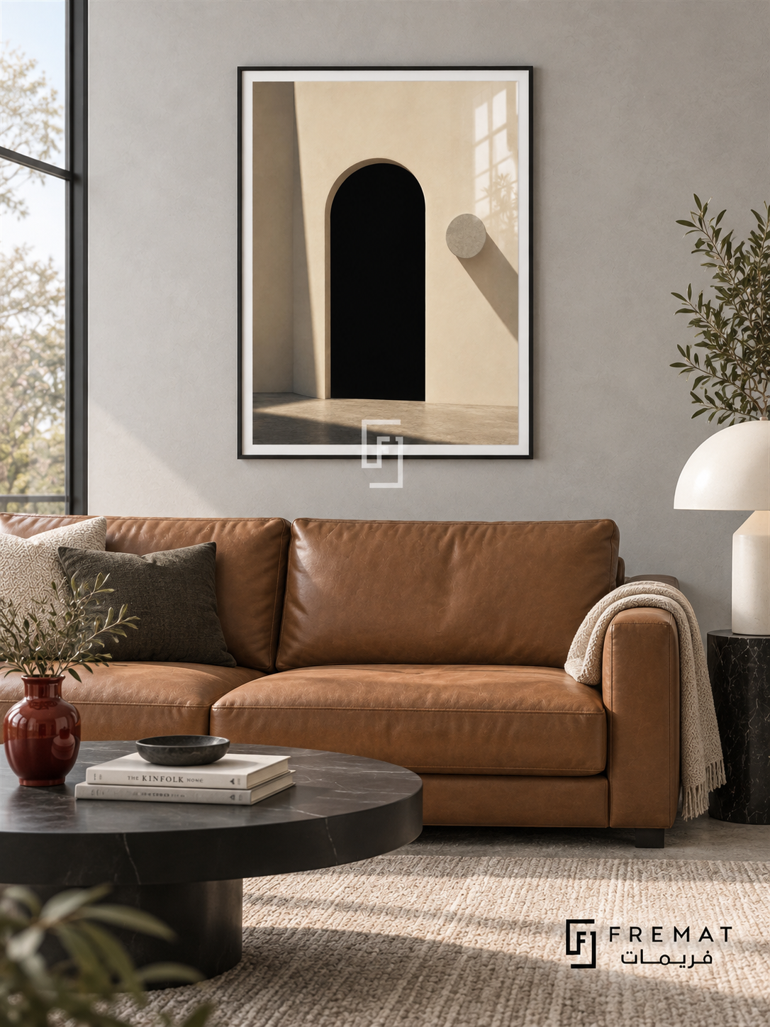 Doorway Study (PLC10) framed architectural wall art with a matte black PVC frame, flat white paper border and glass reflection. Modern lounge, cool light-gray smooth plaster, caramel leather sofa 180cm.