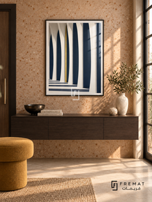 Column Light (PLC11) framed architectural wall art with a matte black PVC frame, flat white paper border and glass reflection. Artful apartment entry, warm peach terrazzo wall, dark floating console 150cm.