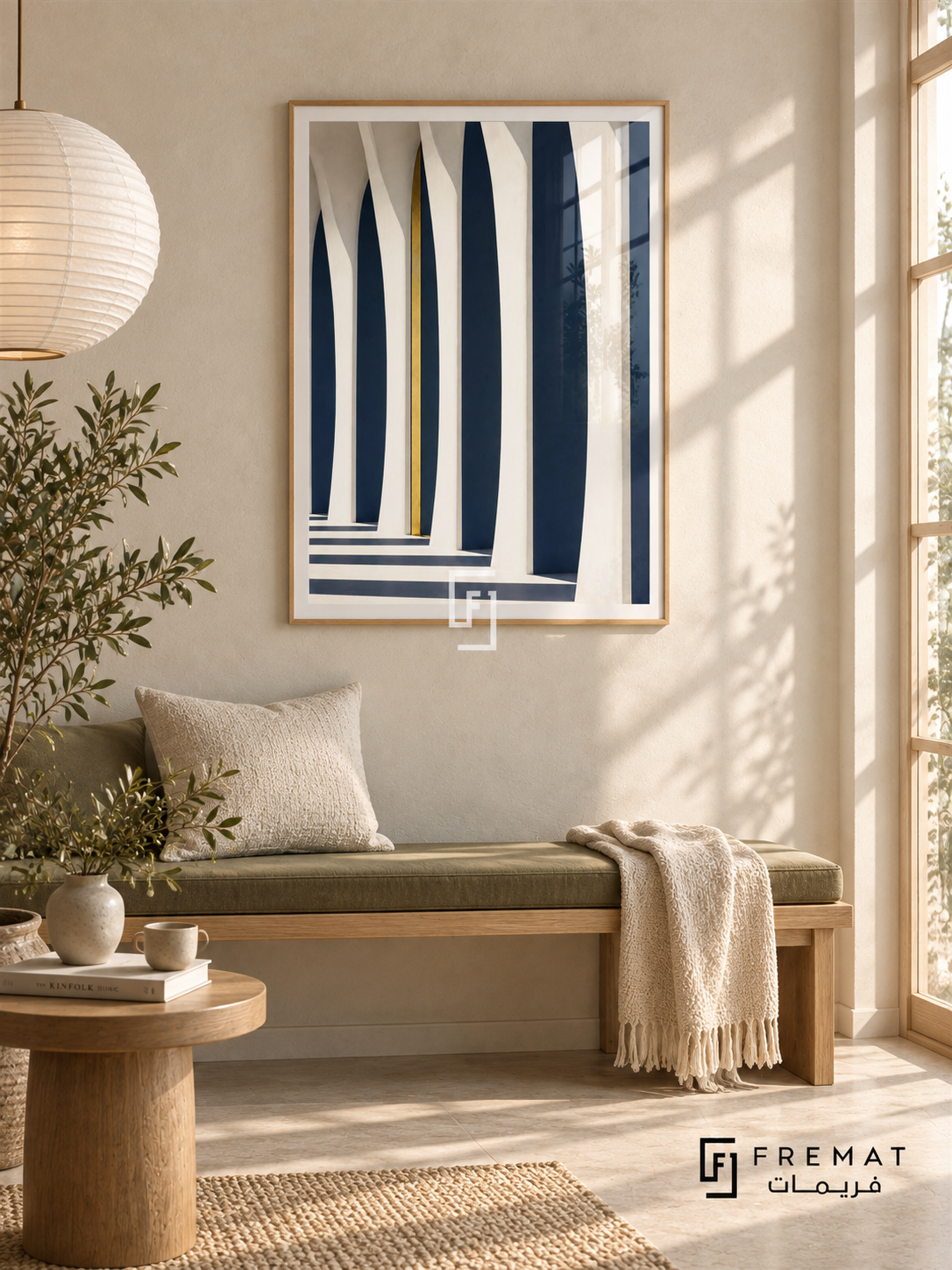 Column Light (PLC11) framed architectural wall art with a light wood-grain PVC frame, flat white paper border and glass reflection. Scandinavian living nook, off-white limewash, birch bench 150cm with muted green seat cushion.
