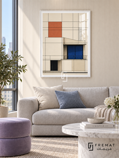 Grid House (PLC13) framed architectural wall art with a satin white PVC frame, flat white paper border and glass reflection. Bright city living room, light beige ribbed wall, pale gray sofa 180cm.