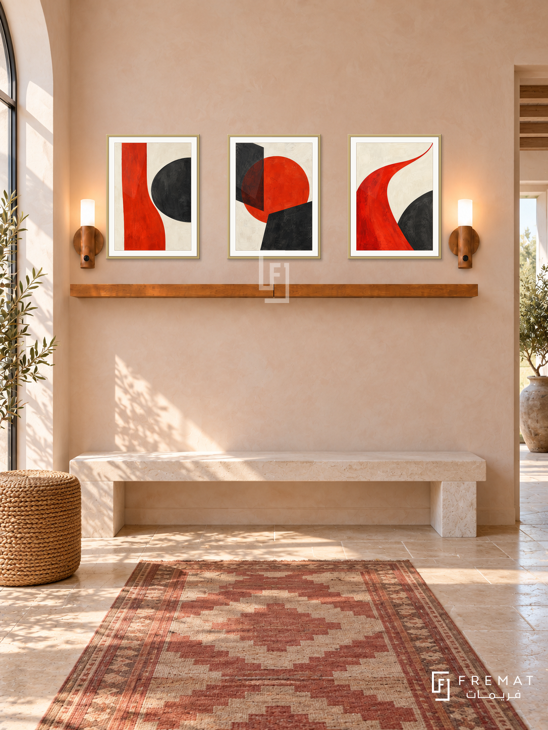 Vermilion Counterpoint shelf set in gold frames, three 30 x 40 cm artworks with equal 2 cm borders, 130 cm honey wood shelf and two warm sensor lamps. Mediterranean entrance hall in morning sunlight.