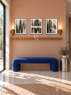 Urban Pulse complete shelf set in black frames: three 30 x 40 cm artworks with 2 cm white borders, honey wood shelf and two sensor lamps. Modern entrance in morning light.