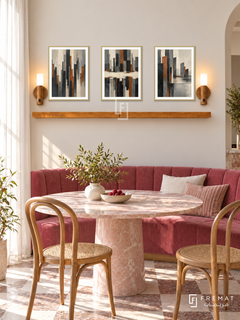 Urban Pulse complete shelf set in gold frames: three 30 x 40 cm artworks with 2 cm white borders, honey wood shelf and two sensor lamps. Colourful dining nook in morning light.