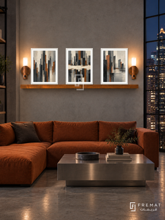 Urban Pulse complete shelf set in white frames: three 30 x 40 cm artworks with 2 cm white borders, honey wood shelf and two sensor lamps. Industrial lounge at night.