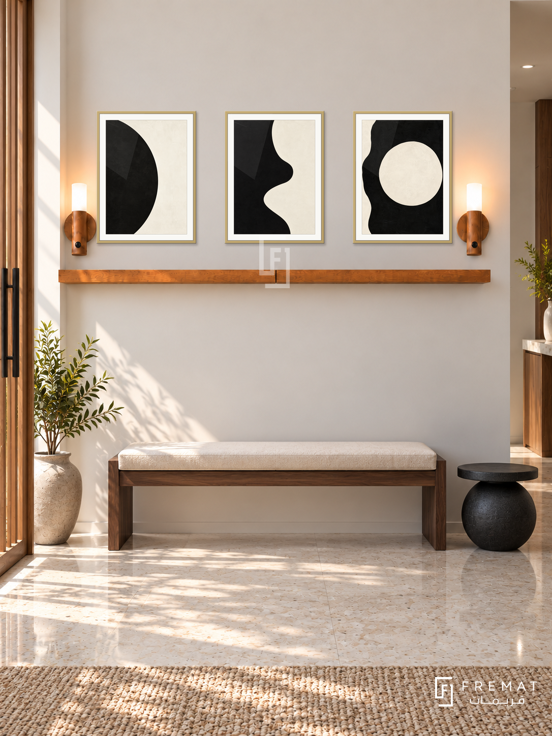 Positive Negative shelf set in gold frames, three 30 x 40 cm artworks with 2 cm borders, honey wood shelf and two sensor lamps. Morning refined modern entrance.
