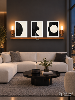 Positive Negative shelf set in white frames, three 30 x 40 cm artworks with 2 cm borders, honey wood shelf and two sensor lamps. Night gallery-like apartment lounge.