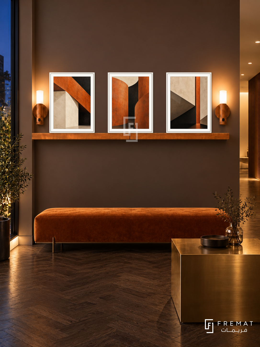 Burnt Orange Architecture shelf set in white frames, three 30 x 40 cm artworks with 2 cm borders, honey wood shelf and two sensor lamps. Night modernist reception.