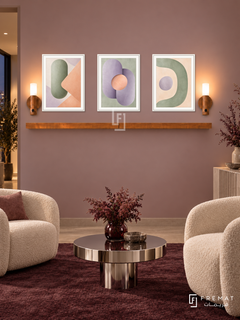 Soft Machines shelf set in white frames, three 30 x 40 cm artworks with 2 cm borders, honey wood shelf and two sensor lamps. Night modern blush reception.