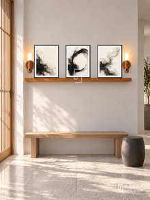 FREMAT SH-ABS20-BLK shelf set with three 30 x 40 cm framed artworks, 2 cm white borders, honey wood shelf and two upward sensor lamps. Morning daylight interior.