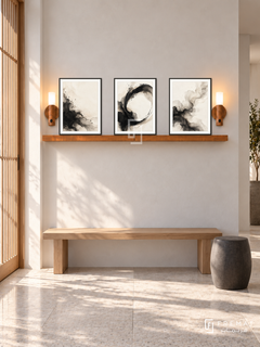 FREMAT SH-ABS20-BLK shelf set with three 30 x 40 cm framed artworks, 2 cm white borders, honey wood shelf and two upward sensor lamps. Morning daylight interior.