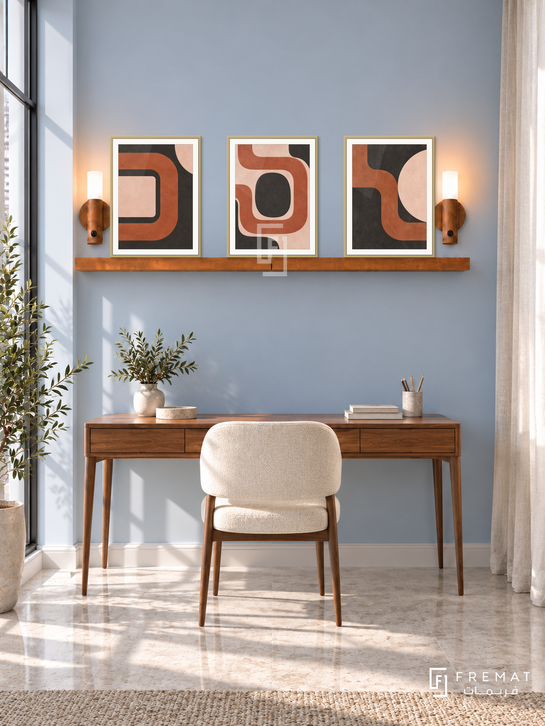 FREMAT SH-ABS22-GLD shelf set, three 30 x 40 cm artworks with 2 cm white mats, honey wood shelf and two upward sensor lamps. Morning modern blue study, powder blue wall, walnut writing desk below shelf, cream chair, pale stone floor, linen curtains right.