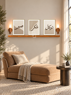 FREMAT Linen Devotion shelf set with three 30 x 40 cm frames, 2 cm white borders, honey wood shelf and two warm sensor lamps. Morning contemporary beige reading corner, oatmeal wall, camel chaise, dark bronze round side table, wool rug, wide linen window right.