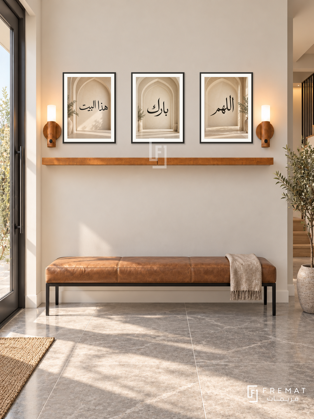 FREMAT Home Blessing shelf set with three 30 x 40 cm frames, 2 cm white borders, honey wood shelf and two warm sensor lamps. Morning modern family entrance, warm ivory wall, long caramel leather bench on slim black legs, geometric grey limestone floor, steel door left, small olive tree right.