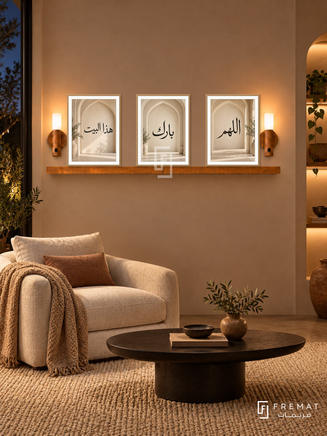 FREMAT Home Blessing shelf set with three 30 x 40 cm frames, 2 cm white borders, honey wood shelf and two warm sensor lamps. Night contemporary terracotta reading room, pale clay wall, low ivory linen lounge chair, oval black table, woven cream carpet, illuminated niche far right.