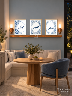 FREMAT Blue Garden shelf set with three 30 x 40 cm frames, 2 cm white borders, honey wood shelf and two warm sensor lamps. Night modern country breakfast nook, mist blue wall, cream banquette, round oak table and curved blue chair, stone tiles, dark garden window right.