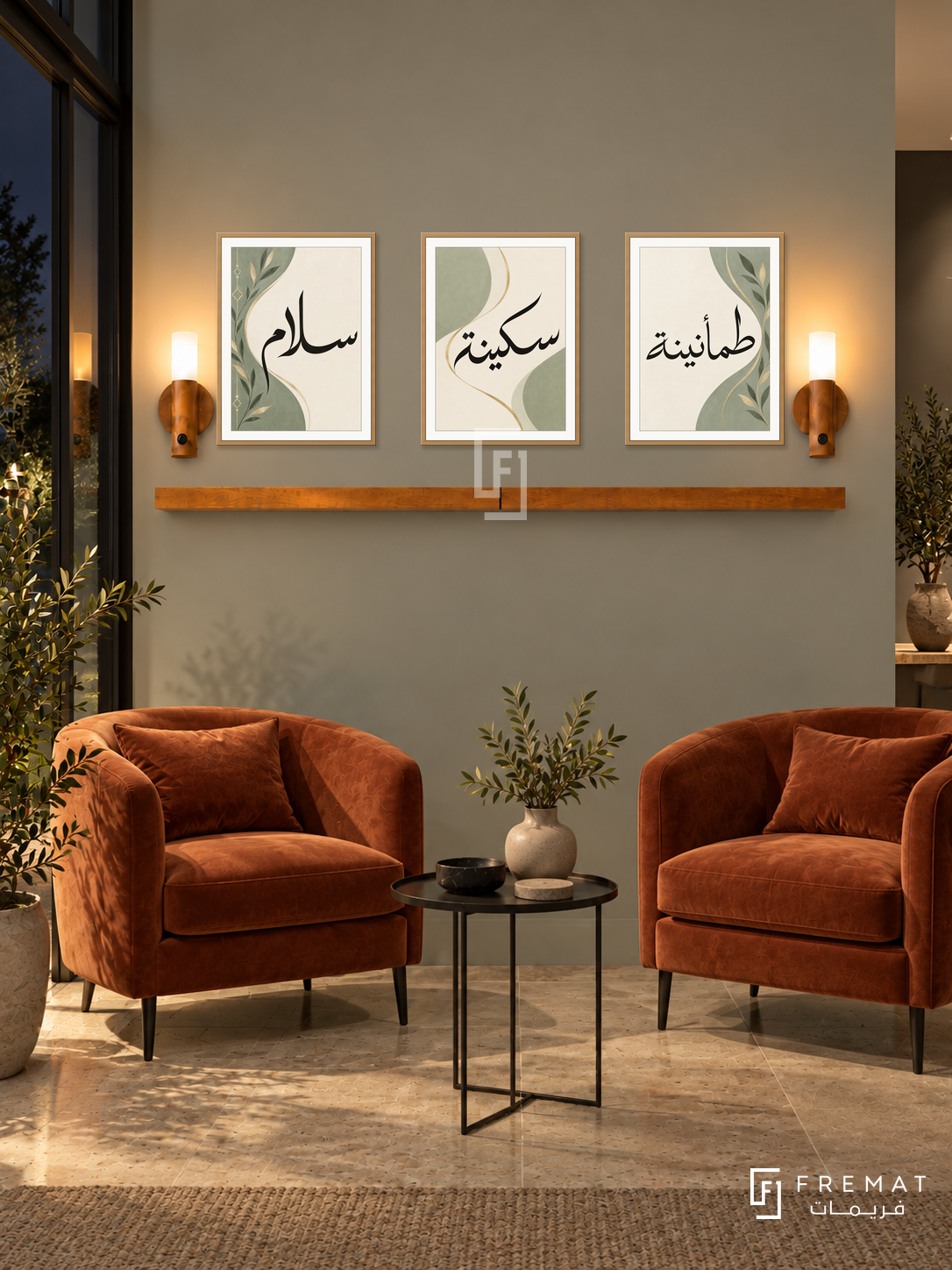 FREMAT Sage Ribbon shelf set with three 30 x 40 cm frames, 2 cm white borders, honey wood shelf and two warm sensor lamps. Night modern conservatory lounge, light grey-green wall, pair of terracotta velvet chairs, small black metal table, limestone floor, dark steel-framed window left.
